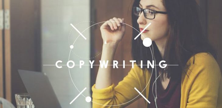 Photo of a copywriter writing copy for a landing page